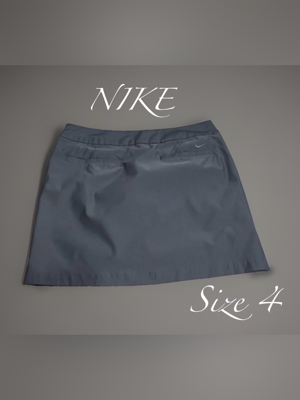 Nike Skirt/Skort in Dark Grey Size 4  Like “New”  In  Great Condition